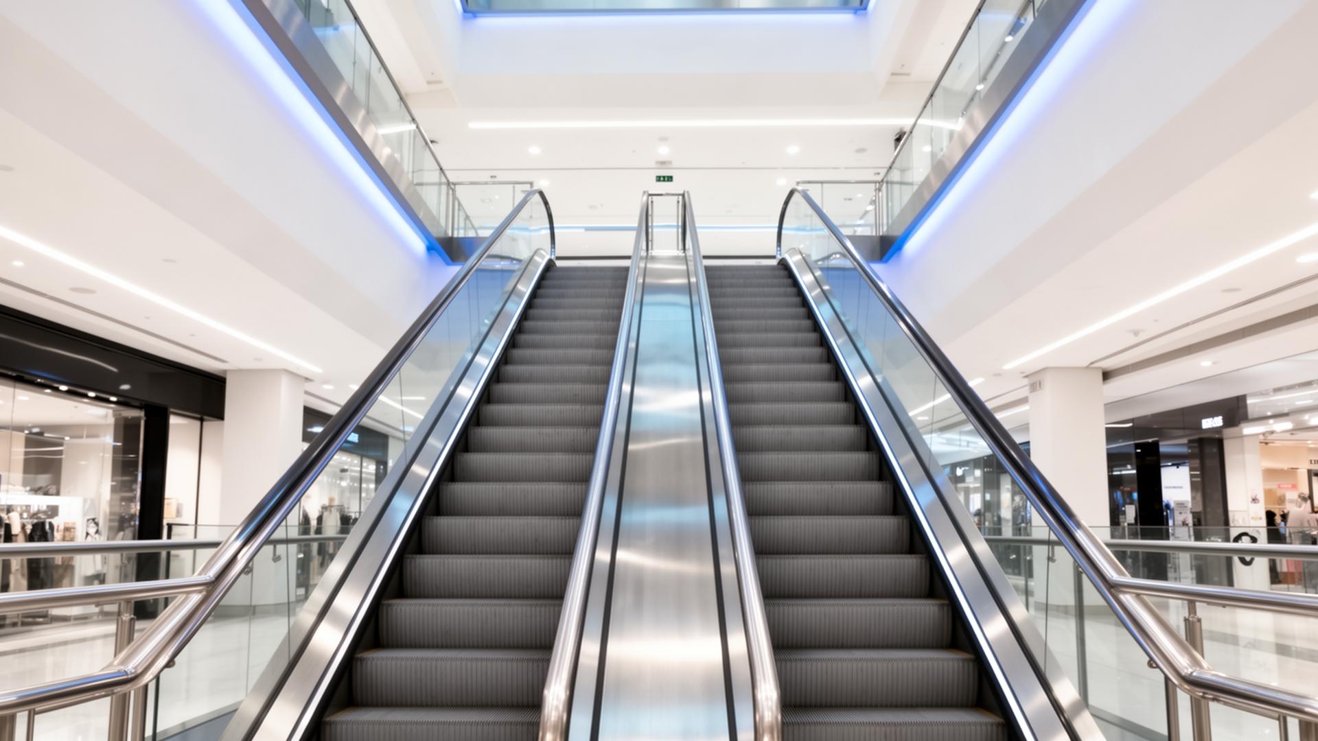 Modern escalator in commercial building